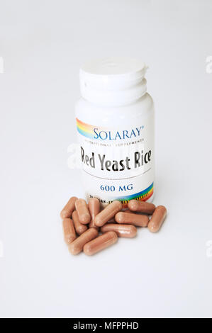 Red yeast rice tablets a natural remedy to help reduce cholesterol levels one of the herbal remedies possibly to disappear from stores in the UK and a Stock Photo