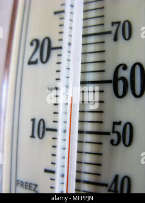 Indoor thermometer indicating very cold temperatures Stock Photo