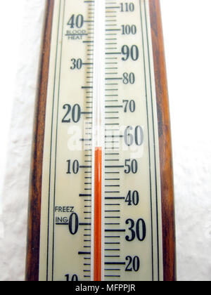 Indoor thermometer indicating very cold temperatures Stock Photo