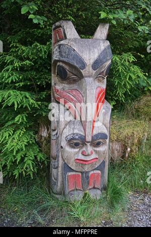 native alaskan totem pole on a sunny day, totem bight
