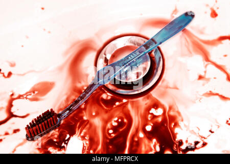 Sink with faucet and bloody toothbrush