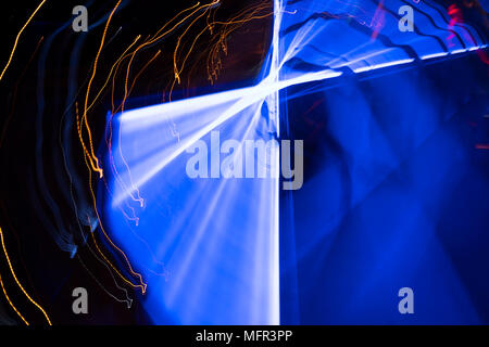 Abstract neon lights at night time looks like light saber. Stock Photo