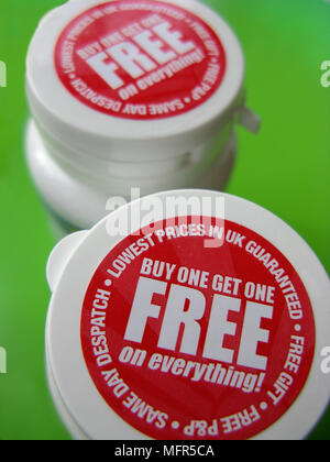 Buy 1 get 1 free bargain on goods in a store Stock Photo