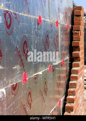 Brick wall with celotex thermal insulation board in cavity & cavity walls in an exptension or new property Stock Photo