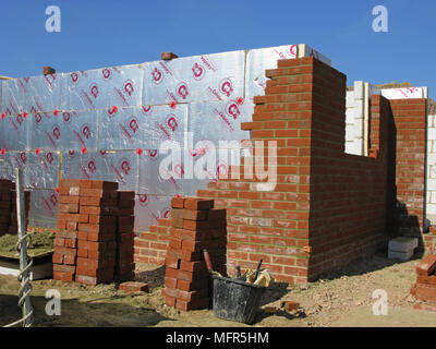 Brick wall with celotex thermal insulation board in cavity & cavity walls in an exptension or new property Stock Photo