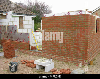 Brick wall with celotex thermal insulation board in cavity & cavity walls in an exptension or new property Stock Photo