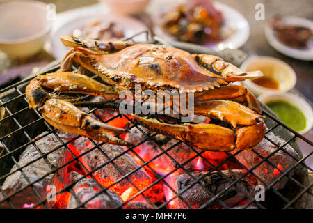 Grilled crab on a flaming grill, Thailand street food Stock Photo