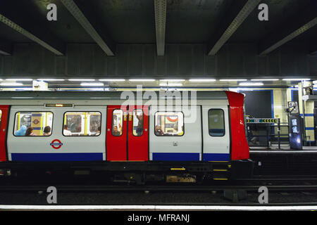 London, UK - May 04, 2018 - Trains about to depart from Aldgate East tube station Stock Photo