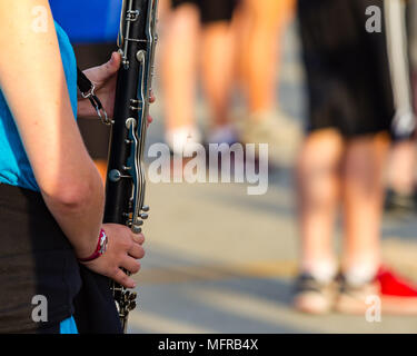 the hands of a bass clarinet player at rehearsal Stock Photo