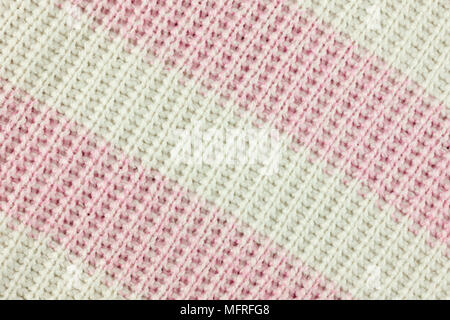 White and pink alternately Diagonal. Yarn Abstract background Stock Photo