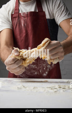 cropped image of chef preparing dough Stock Photo