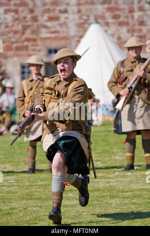 First World War re-enactor in the uniform of the Gordon Highlanders demonstrating bayonet drill. Stock Photo