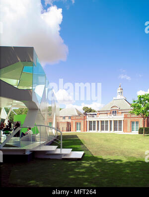 Exterior of the Pavilion designed by Toyo Ito in the grounds of the Serpentine Gallery in Hyde Park  with the Gallery in the background Stock Photo