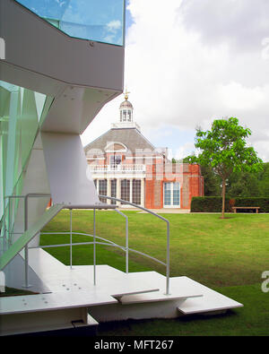 Exterior of the Pavilion designed by Toyo Ito in the grounds of the Serpentine Gallery in Hyde Park  with the Gallery in the background Stock Photo