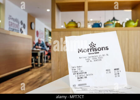 Receipt (for a breakfast omelette) placed on a table at the Morrisons cafe in Corby, England. Stock Photo