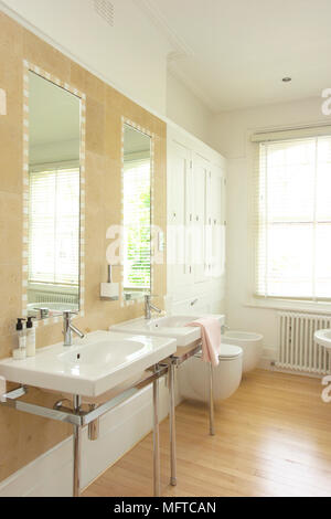 Two washbasins in modern bathroom Stock Photo