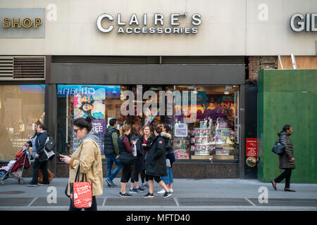 A Claire's Store in Midtown Manhattan in New York on Saturday, April 21, 2018. The retailer, owned by Apollo Global Management, is among the many that have been hit with the perfect storm of online shopping and teens spending their money on electronics. (© Richard B. Levine) Stock Photo