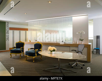 Chair at oval desk in modern office Stock Photo