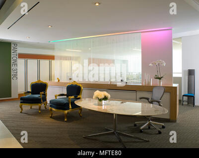 Chair at oval desk in modern office Stock Photo