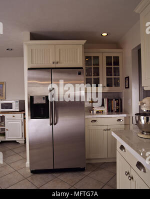 Cream Colored Kitchen With Stainless Steal Appliances Stock Photo -  Download Image Now - iStock