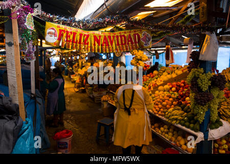 Unidentified people on the San Pedro Market in Cusco, Peru. Markets play very important part of todays culture in Peru. Stock Photo