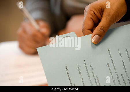 Medical professionals working with medical assessments at a UK hospital. Stock Photo