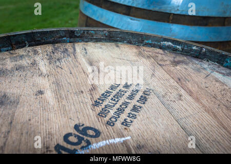 Top of a whiskey whisky barrel with Bourbon stencilled. Stock Photo