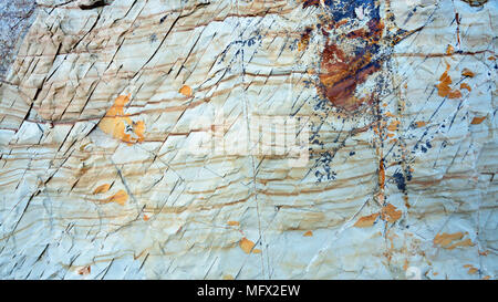 Natural stone background abstract in appearance - blue, rust, brown and tan Stock Photo