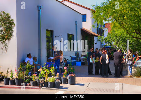 People shopping at the farmers market outside the Mercado San Agustin in downtown Tucson, Arizona. Stock Photo