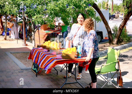 People shopping at the farmers market outside the Mercado San Agustin in downtown Tucson, Arizona. Stock Photo