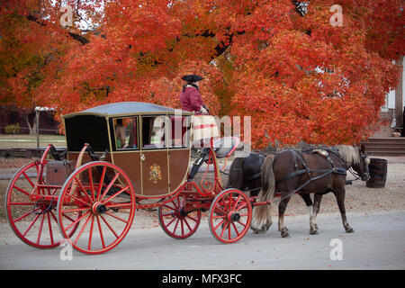 Horse drawn restored carriage on Duke of Gloucester street in colonial Williamsburg Virginia Stock Photo