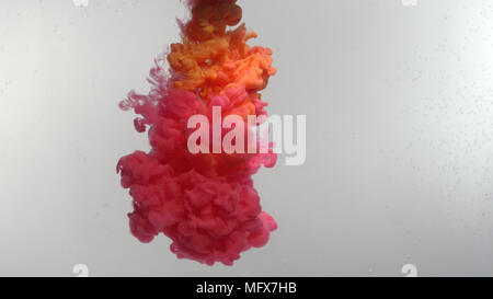 Pink and orange smoke clouds over white background 2 Stock Photo