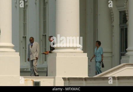 Washington, District of Columbia, USA. 9th July, 2002. Bill Cosby departs the White House after receiving the Presidential Madal of Freedom from U.S. President George W. Bush during a ceremony in the East Room of the White House in Washington, DC on July 9, 2002.Credit: Ron Sachs/CNP Credit: Ron Sachs/CNP/ZUMA Wire/Alamy Live News Stock Photo