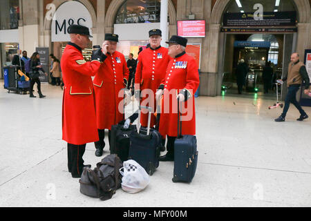 London UK. 27th April 2018. A group of Chelsea pensioners preparing to travel and board their trains from Waterloo station for the weekend Credit: amer ghazzal/Alamy Live News Stock Photo