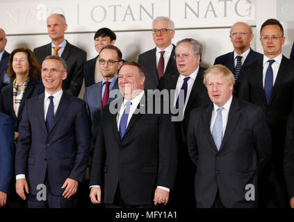Brussels, Belgium. 27th Apr, 2018. NATO Foreign Ministers pose for a family photo during their meeting at NATO headquarters in Brussels, Belgium, April 27, 2018. Credit: Ye Pingfan/Xinhua/Alamy Live News Stock Photo