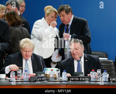 Brussels, Belgium. 27th Apr, 2018. U.S. Secretary of State Mike Pompeo (R, front) and British Foreign Secretary Boris Johnson (L, front) attend the NATO Foreign Ministers meeting at its headquarters in Brussels, Belgium, April 27, 2018. Credit: Ye Pingfan/Xinhua/Alamy Live News Stock Photo