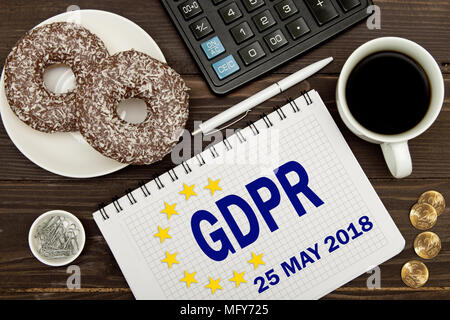 GDPR. Notebook with Notes General Data Protection Regulation on the table of a businessman . Stock Photo