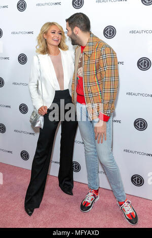 NEW YORK, NY - APRIL 21: Paris Hilton and Phillip Picardi attends Beautycon Festival NYC 2018 - Day 1 at Jacob Javits Center on April 21, 2018 in New  Stock Photo