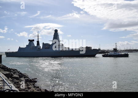 HMS DIAMOND ENTERING PORTSMOUTH HARBOUR WITH TUG ESCORT. APRIL 26TH 2018 Stock Photo