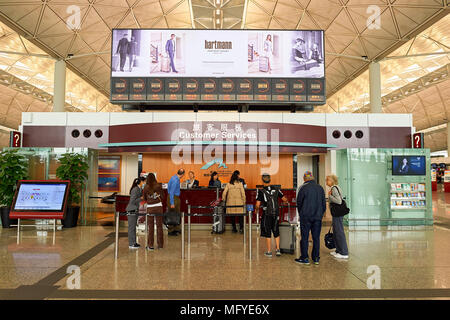 HONG KONG - NOVEMBER 03, 2015: customer sevises desk in Hong Kong International Airport. Stock Photo