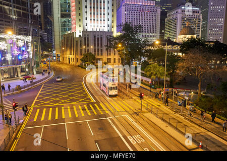 HONG KONG - DECEMBER 25, 2015: double-decker tramway in Hong Kong at night. Stock Photo
