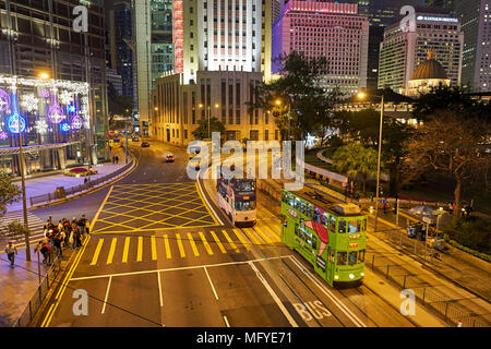 HONG KONG - DECEMBER 25, 2015: double-decker tramways in Hong Kong at night. Stock Photo