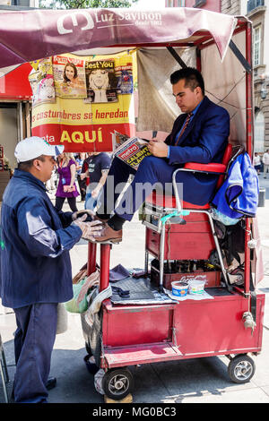 Mexico City,Mexican,Hispanic,historic Center Centre,Calle Gante,pedestrian street,shoe shine stand,shoeshiner,boot polisher,man men male MX180305130 Stock Photo