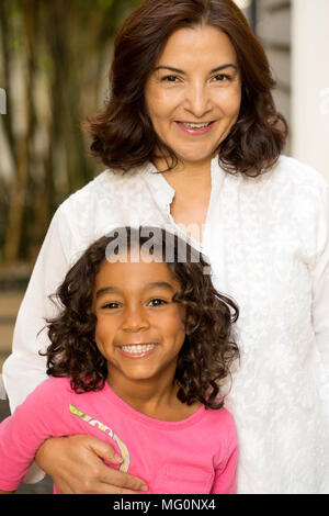Hispanic mother and her daughter. Stock Photo