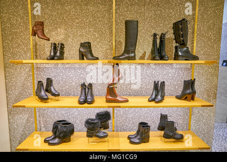 BOOTS ON DISPLAY AT VALENTINO FASHION BOUTIQUE Stock Photo - Alamy