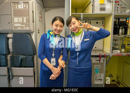 BUSAN, SOUTH KOREA - CIRCA MAY, 2017: Air Busan crew members posing for taking photo. Stock Photo