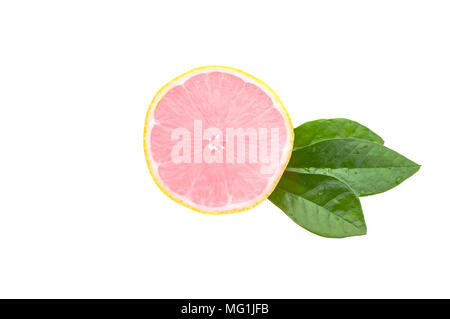 Half of a fresh, clean, glowing pink lemon with green leaves on a white background. Stock Photo