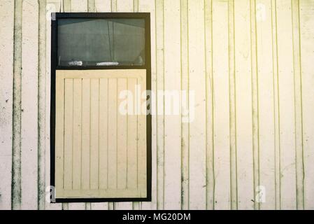 Old Windows on Wood Wall with Light Leak. Stock Photo