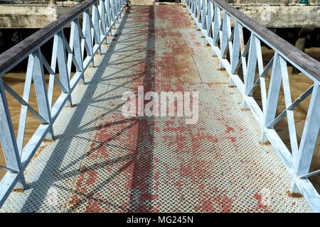 Diamond Plate Pathway to Pier. Stock Photo