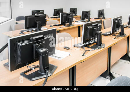 Empty computer room neatly placed for student in a computer lab. Stock Photo